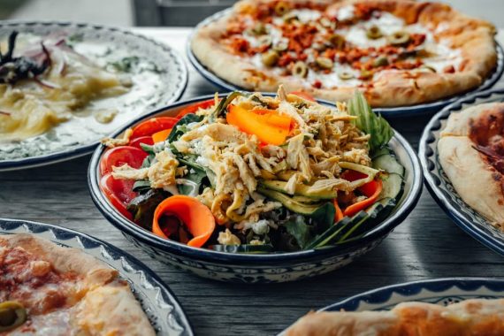 A vibrant spread of Mexican and Italian dishes, perfect for a delicious meal.